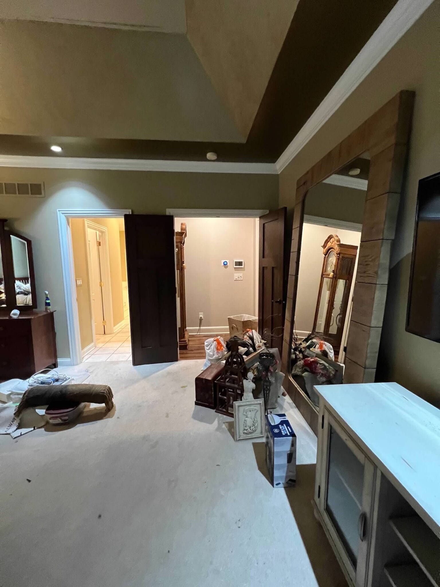 Beth reduced the client's bedroom double doors to one and utilized the hallway to locate the linen closet.